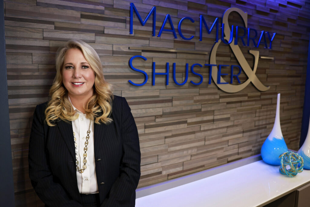 Michele Shuster with M&S logo