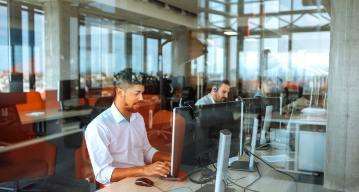 Team of colleagues working in a call center.