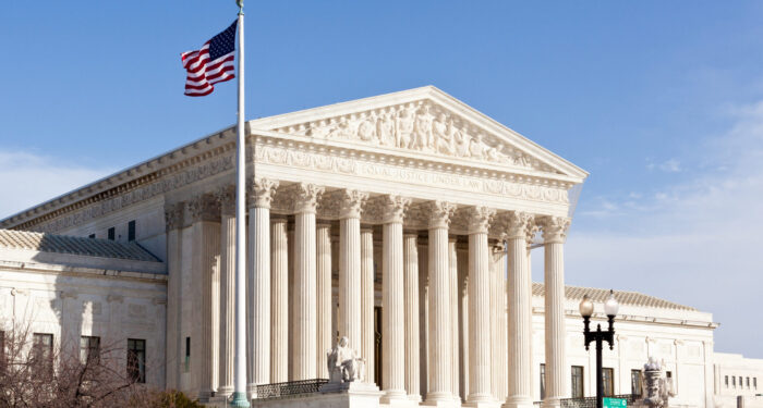 Facade of US Supreme court in Washington DC on sunny day