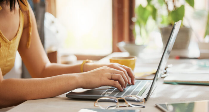 Computer, woman hands and online working of a remote employee with code work at home. Web research, internet and pc writing of a female freelancer typing on a laptop planning for coding writer job Computer, woman hands and online working of a remote employee with code work at home. Web research, internet and pc writing of a female freelancer typing on a laptop planning for coding writer job.