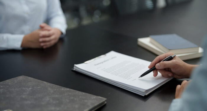 Business people breaking the contract with resignation letter staff reduction resigning leaving the office employee Resignation.