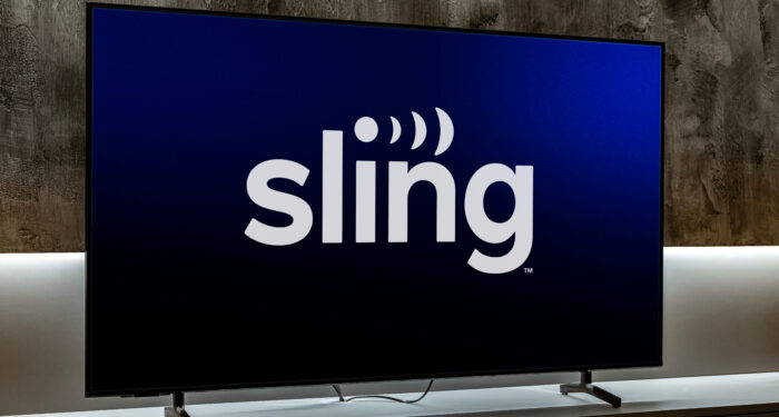 POZNAN, POL - DEC 19, 2023: Flat-screen TV set displaying logo of Sling TV, is an American over-the-top internet television service owned by Dish Network