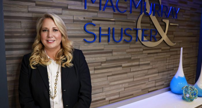 Michele Shuster with M&S logo